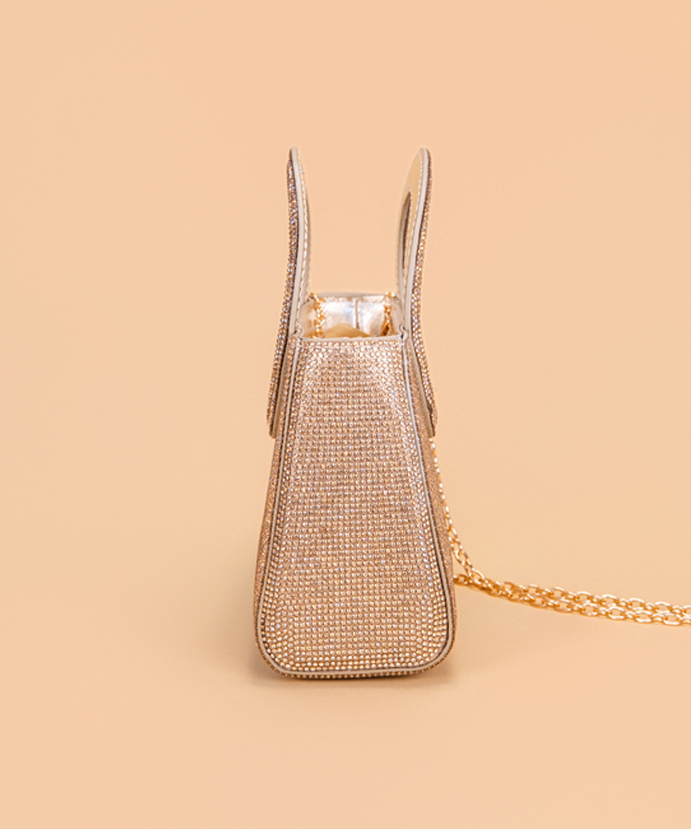 The Darlin Garland Clutch in Gold