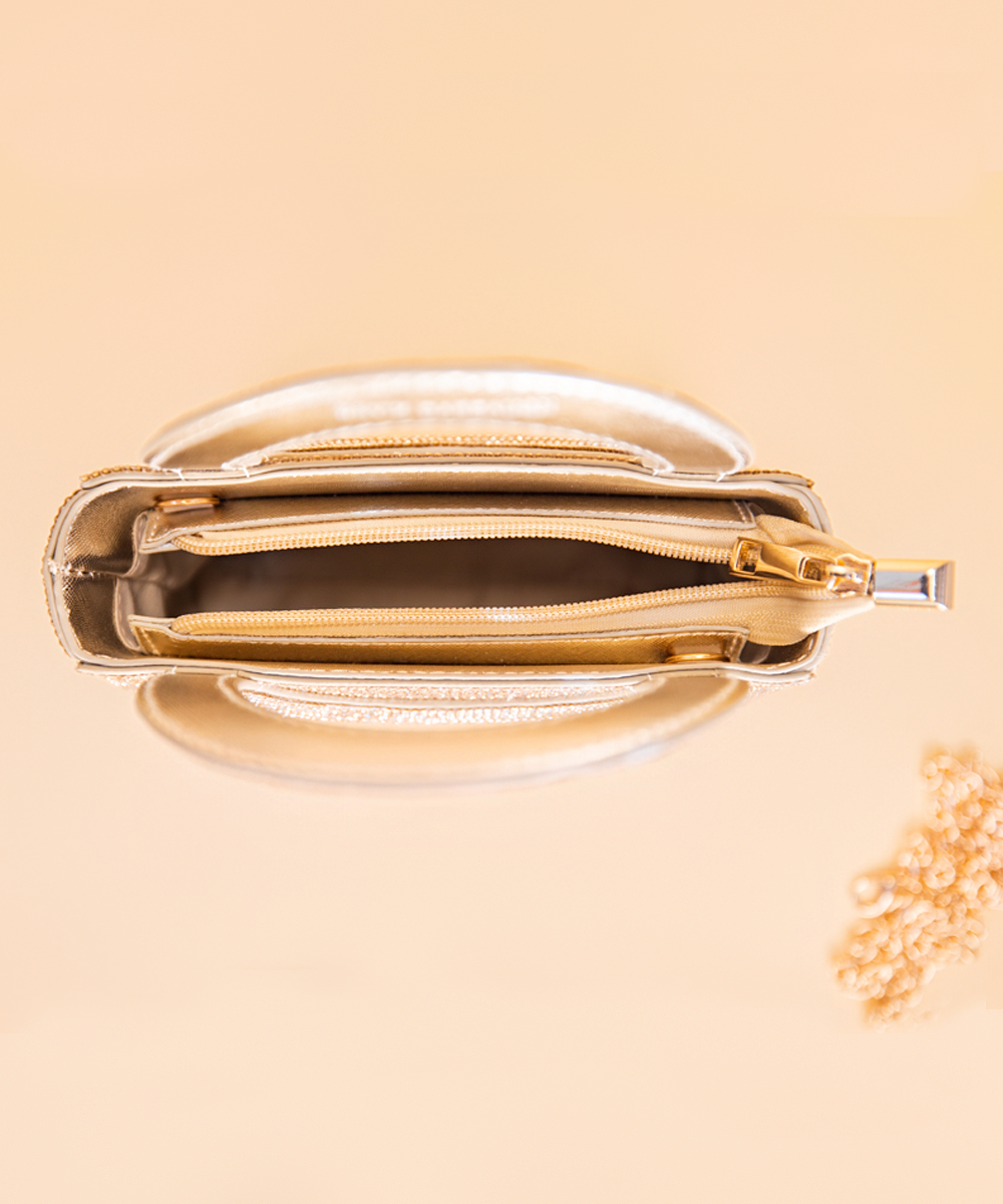 The Darlin Garland Clutch in Gold